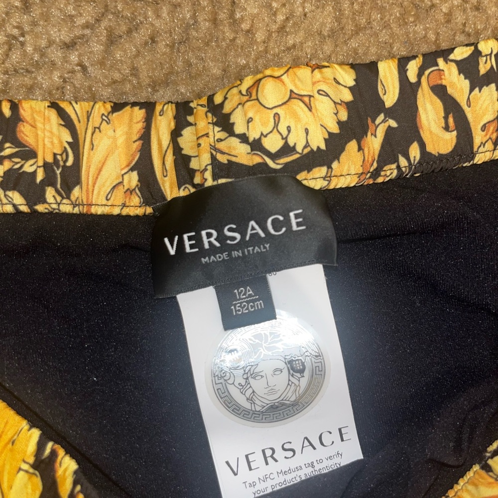 Authentic versace swimming trunks.size 12